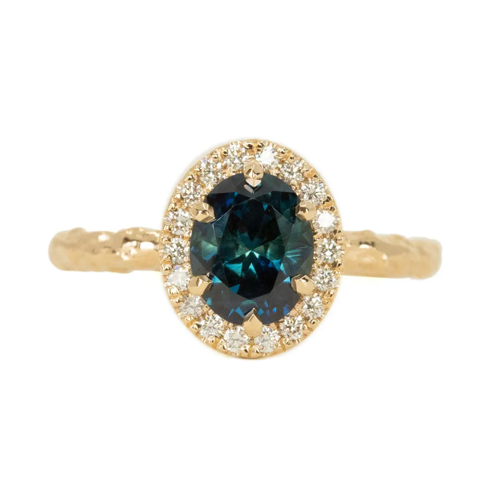 1.63ct Oval Deep Blue Unheated Sapphire and Diamond Six Prong  Halo Evergreen Ring in 14k Yellow Gold