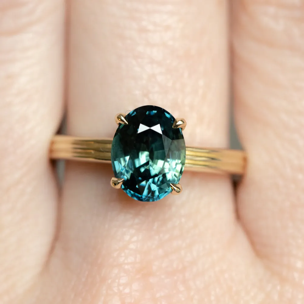 3.59ct Oval Deep Teal Madagascar Sapphire Low Profile Tri-Band Three Winds 4 Prong Solitaire in 14k Yellow Gold